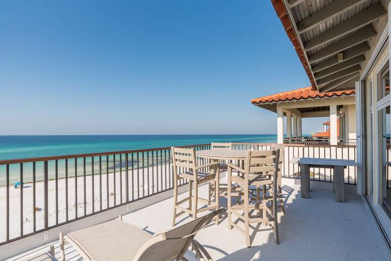 Ocean-view Balcony With Chairs, Bright Blue Sky
