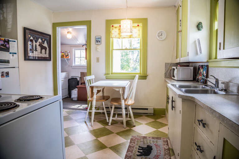 Enjoy a meal at the dining table with seating for two