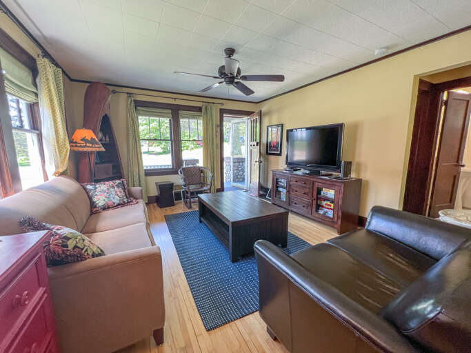 The front door leads into the cozy living room.