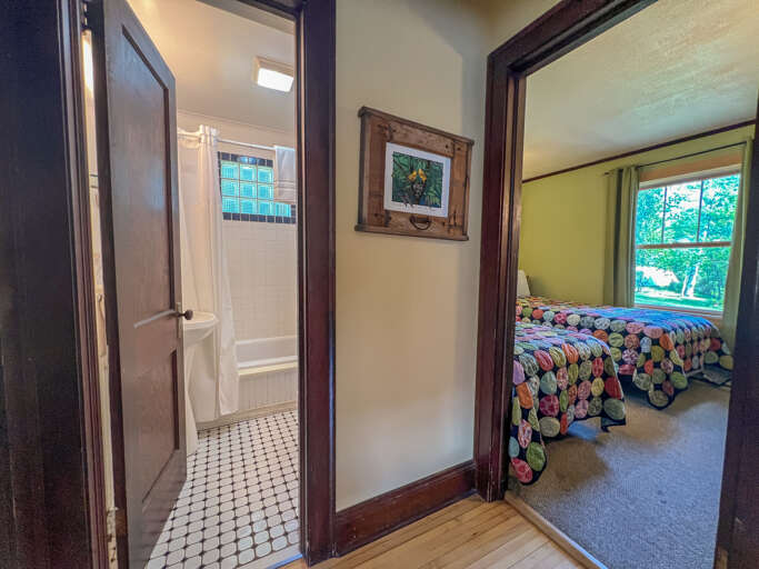 Across the hall is the guest bedroom.