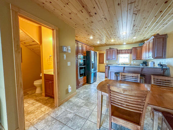 There is a half bathroom off of the dining area.