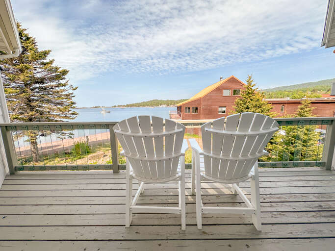 Enjoy Grand Marais Harbor views from the balcony.