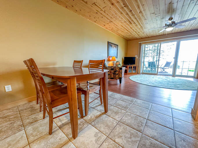 The living room flow into the dining area and kitchen.