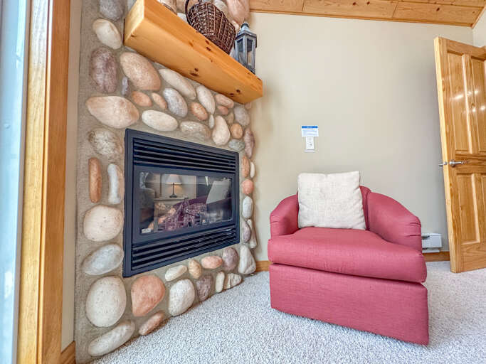 Gas fireplace in bedroom 1. Gas fireplace in bedroom 1.