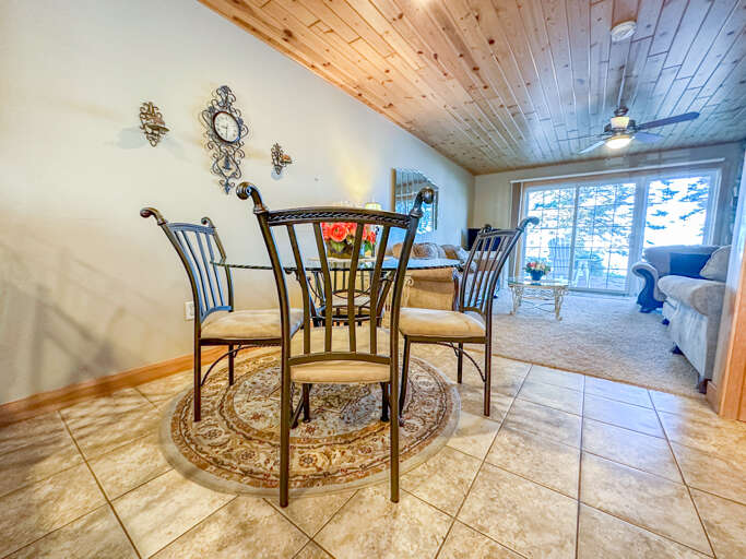 Enjoy a meal at the dining room table with seating for four.