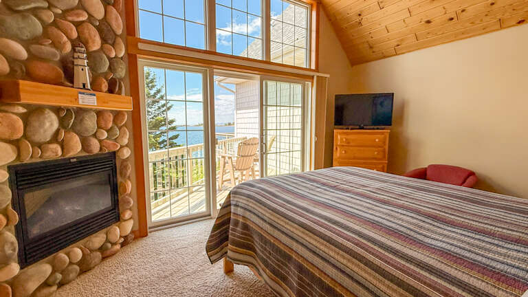 Wake up to sunlight streaming through floor-to-ceiling windows that frame stunning lake views from your bed. Your private balcony invites you to sip morning coffee while soaking in the scenery.