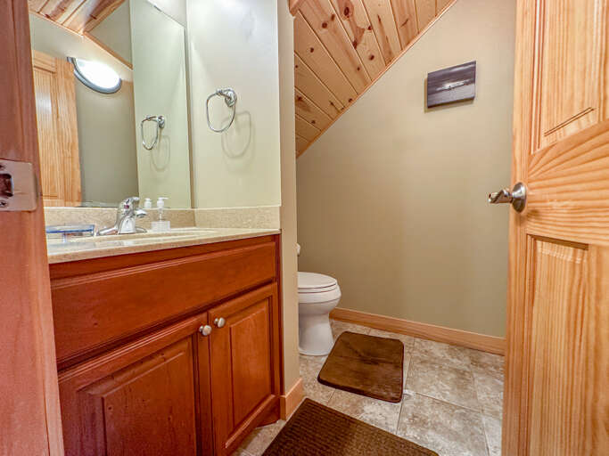 Half bathroom located on the main level off of the dining room.