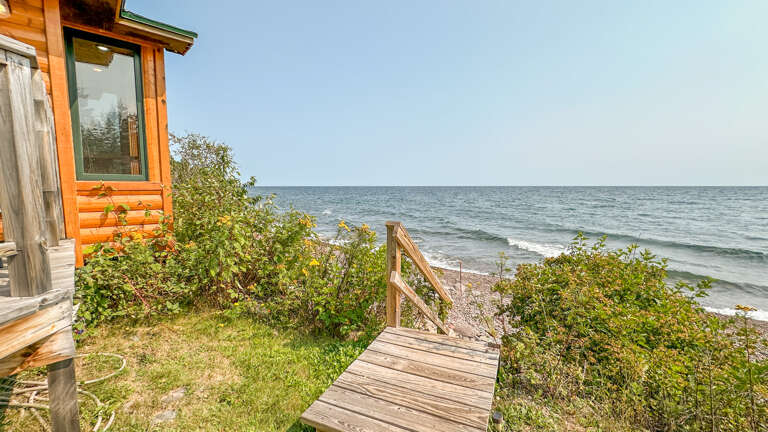 Staircase to the private shoreline area.