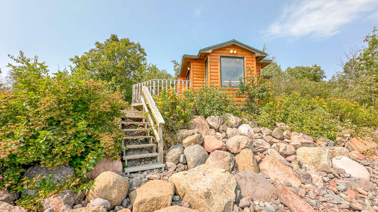 Stairs to the private shoreline area.