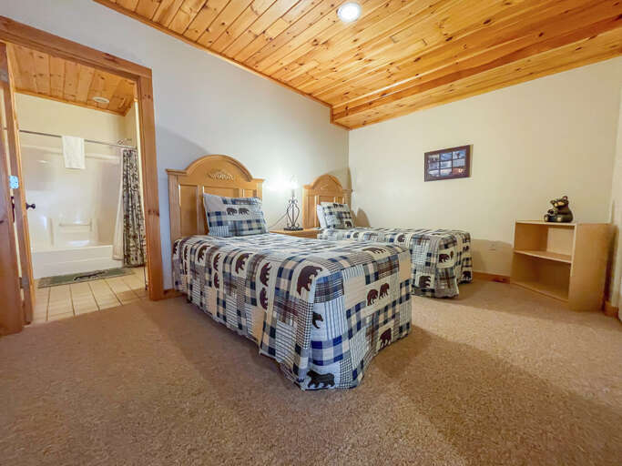 This bedroom is located on the lower level.