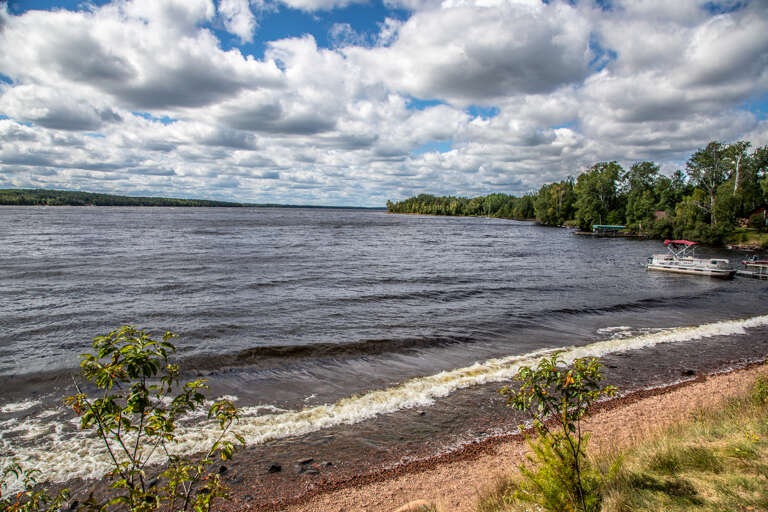 Enjoy swimming, boating, water, and jet skiing in the warm months on Devil Track Lake