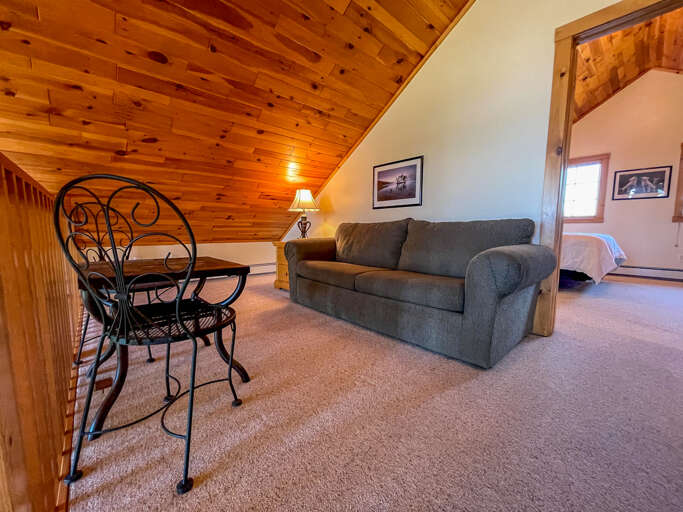 The loft doubles as an additional sleeping area.