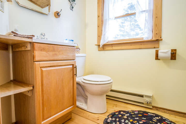 There is a half bathroom in the loft area.