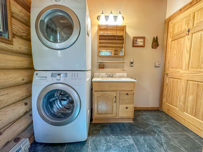 Laundry and vanity in bathroom 1.