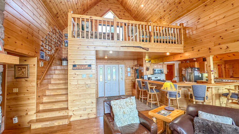 Head upstairs to the loft bedroom.