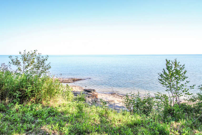 The shoreline is perfect for watching the gorgeous sunrise over Lake Superior and for listening to the waves roll in onto the ledge rocks.