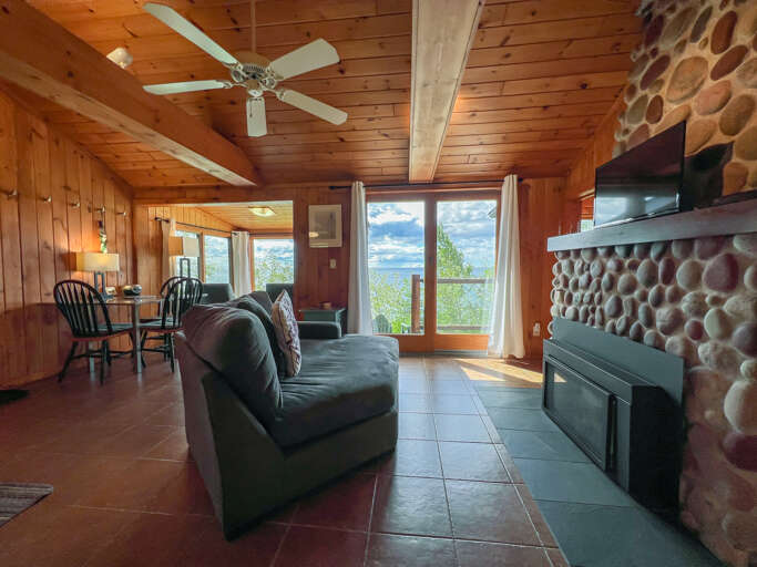 Relax by the fireplace and enjoy a good movie while you enjoy Lake Superior outside the windows.