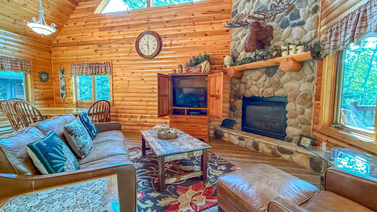 Living Room with TV and Gas Fireplace.