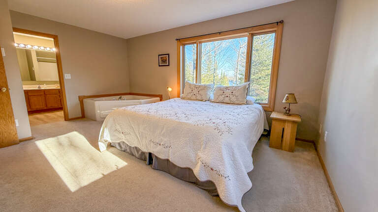 Bedroom 1 with an in-room jetted tub.