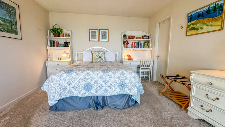 This bedroom has a queen bed.