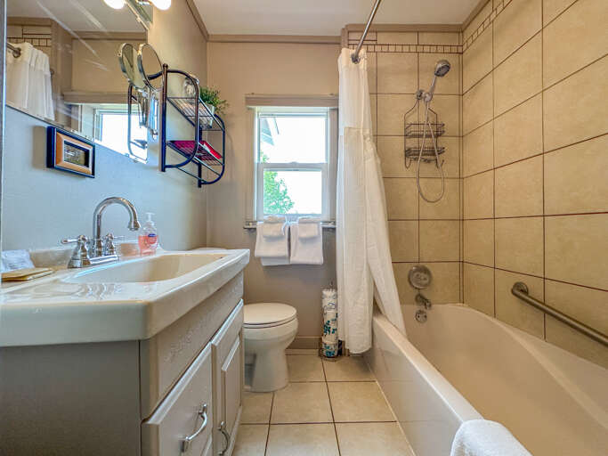 There is a full bathroom located off of the bedroom.