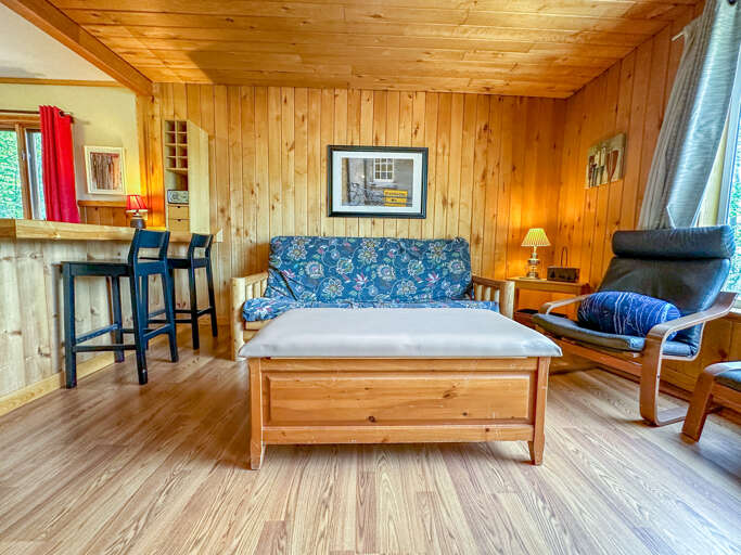 The futon provides an additional sleeping area.