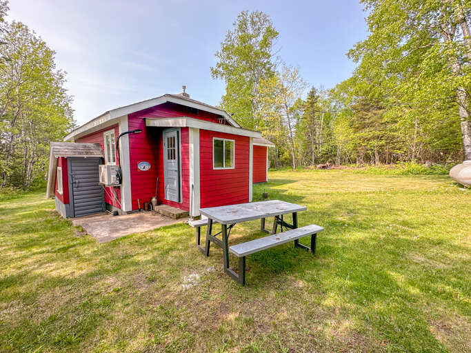 Behind the home is a spacious, private backyard.