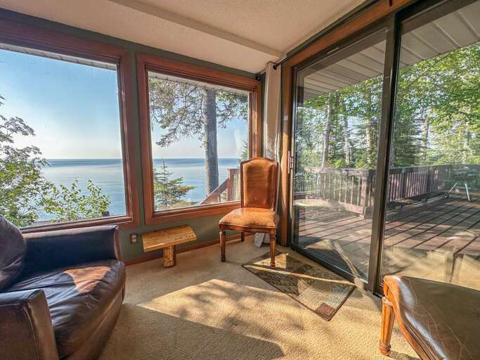 You can also access the lake facing deck from the sitting room. You can also access the lake facing deck from the sitting room.