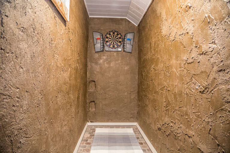 With the feel of a natural cave, this dart room takes the gaming experience to a new level!
