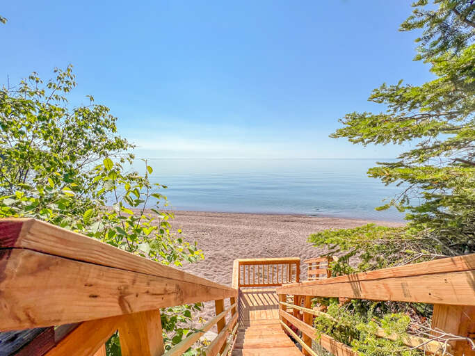 A small set of stairs leads you to the beach area.