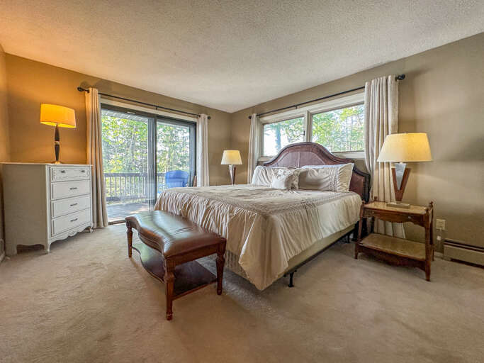 Bedroom 1 has a king bed and is located on the main level. Bedroom 1 has a king bed and is located on the main level.