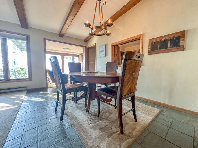 The dining area also features Lake Superior views from the living room windows. The dining area also features Lake Superior views from the living room windows.