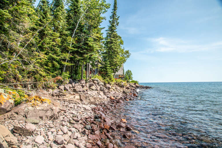 Follow the path in the woods to find your way onto the private section of Lake Superior shoreline.