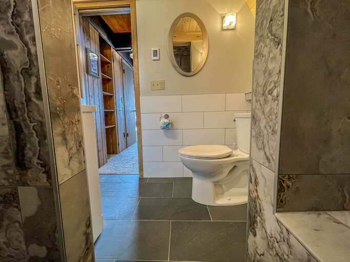 This bathroom features a large walk-in shower.