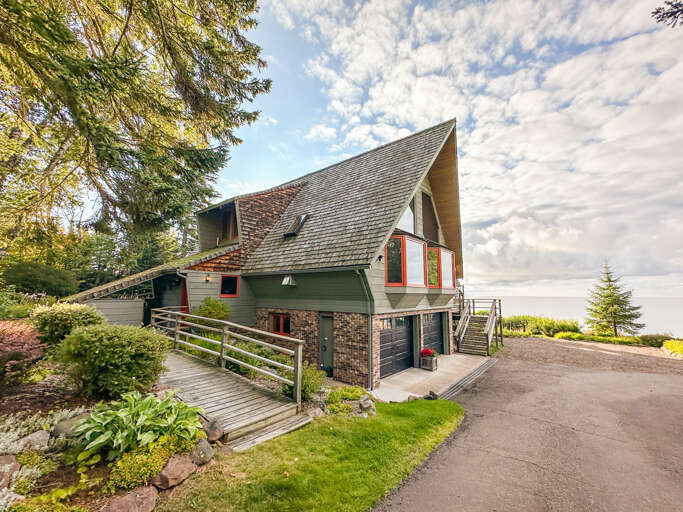 Always Grace features many large lake-facing windows. Always Grace features many large lake-facing windows.