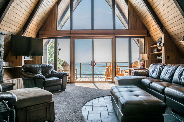 The Always Grace living features stunning floor to ceiling windows and incredible Lake Superior views. The Always Grace living features stunning floor to ceiling windows and incredible Lake Superior views.