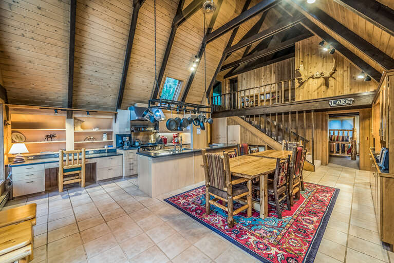 The open beam, arched ceilings make the room seem incredibly spacious. The open beam, arched ceilings make the room seem incredibly spacious.
