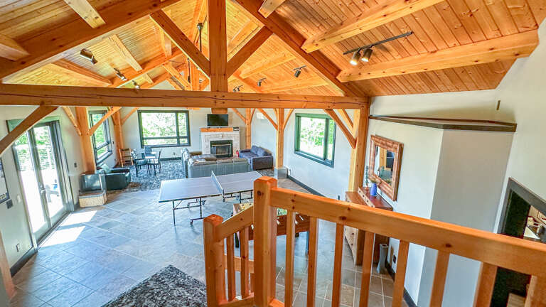 Not head back downstairs to the family/game room area.