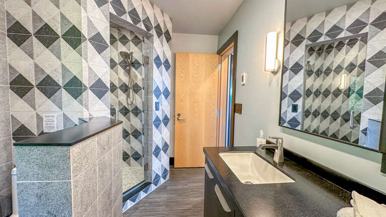 This bathroom has a walk-in shower.
