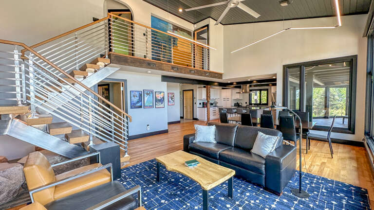 Open layout living area and the upper level bedrooms above.