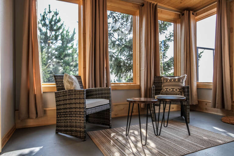 Enjoy the enclosed sitting are that leads to the balcony.