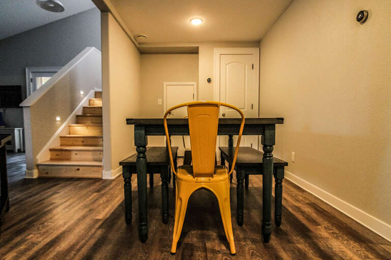 Enjoy a meal at the dining room table  with seating for six