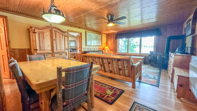 You enter the cabin in the dining room and living room.