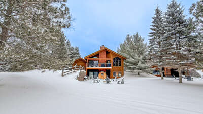 215 Moose Tracks on Devil Track Lake is an immaculate, newly updated 2-story home.