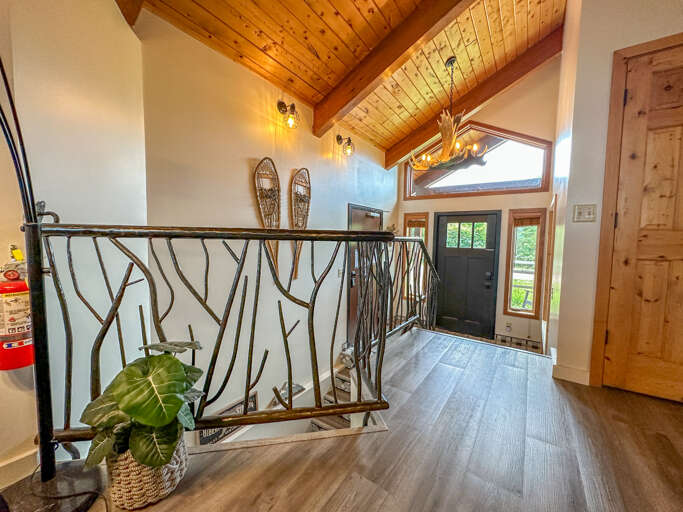 Entryway leading into the main level living room.