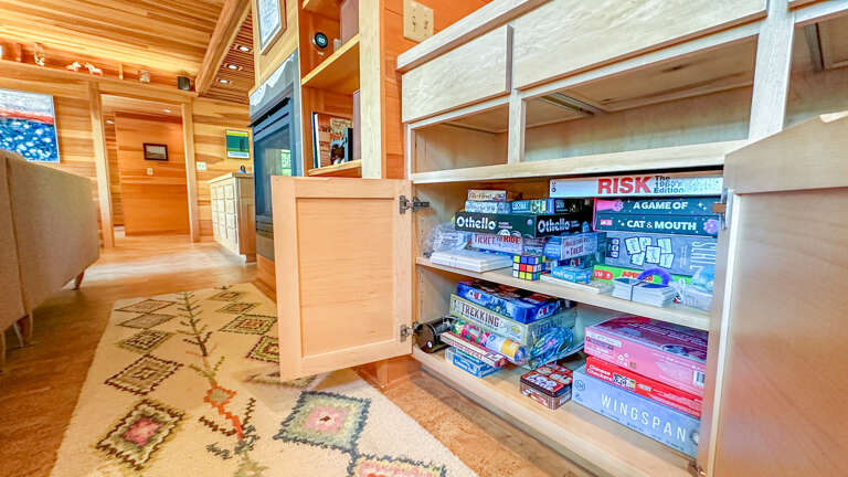 Board games galore, perfect for family game nights on rainy days!