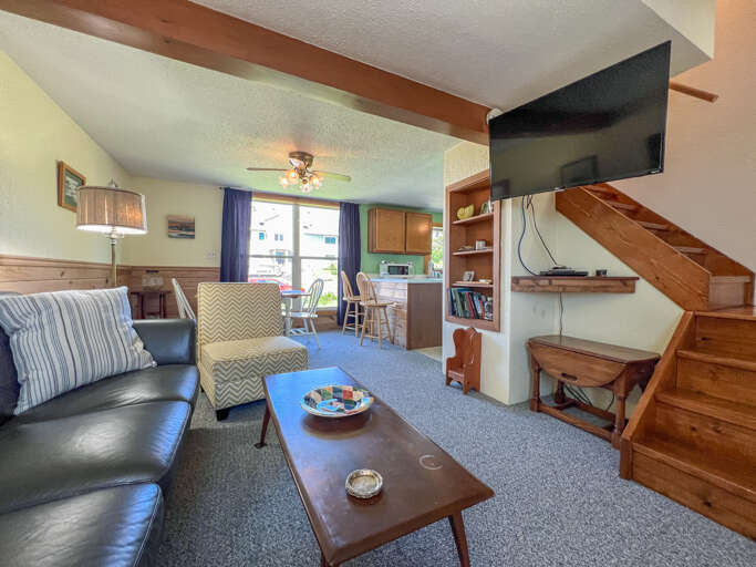 Open living area with a living room, dining area, kitchen.