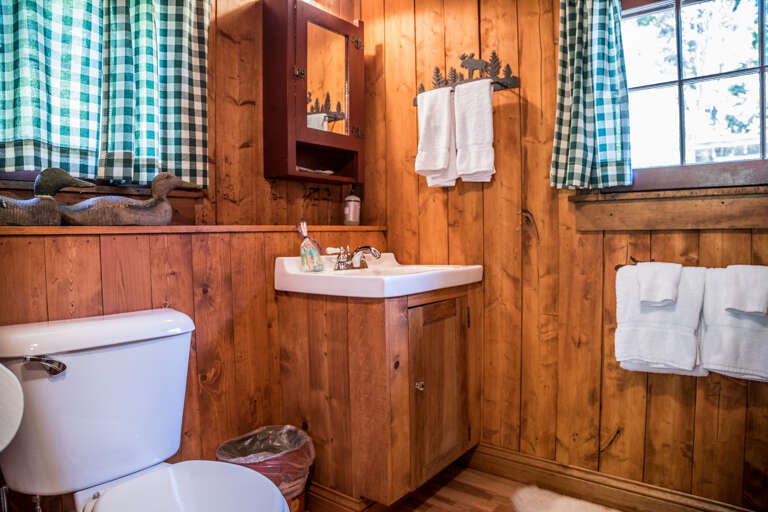 The bathroom located in the main cabin offers a walk-in shower. The bathroom located in the main cabin offers a walk-in shower.