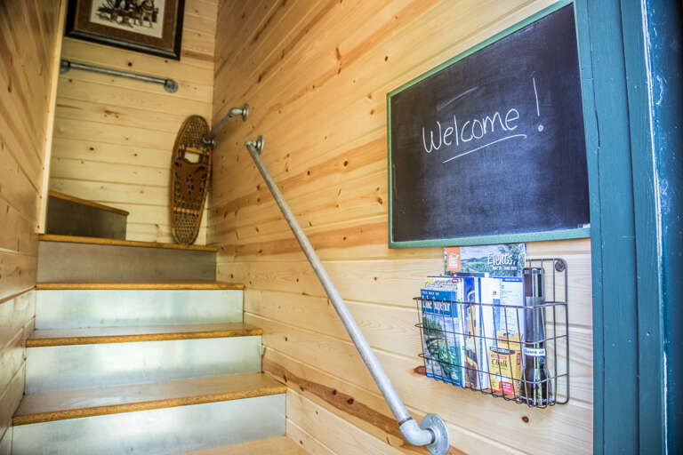 The loft is located above the garage parallel from the main house. The loft is located above the garage parallel from the main house.