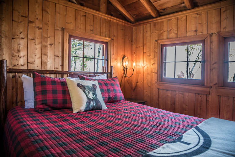 Relax in the cozy bed after a day of exploring the North Shore. Relax in the cozy bed after a day of exploring the North Shore.